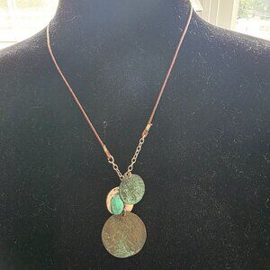 Coldwater Creek corded necklace with distressed round metal coins